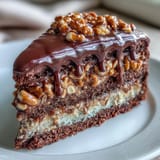 Decadent Father's Day Chocolate Peanut Butter Pretzel Cake stacked high.